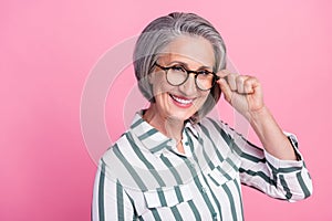 Photo of retired optimistic cheerful businesswoman wear new stylish glasses specs rayban representative director