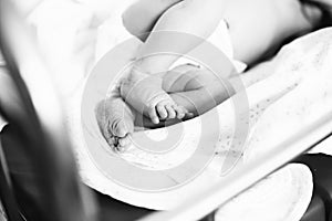 Photo in retro style. newborn baby lying on a diaper.