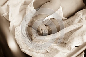 Photo in retro style. newborn baby lying on a diaper.