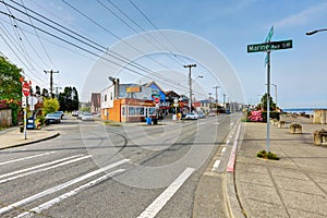 Photo of a road with a road sign at Alki beach park
