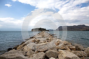 Photo from rocky seascape of Karathonas with great view to Arvanitia hill, Nafplio, Argolida, Peloponnese, Greece - Immagine photo