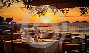 Photo of a romantic sunset dining experience at a picturesque restaurant