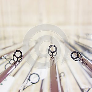 Photo of row of fishing rods in store