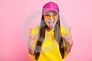 Photo of rude crazy girlfriend wearing yellow sweater hoodie liking to hang out with loud music wearing cap spectacles