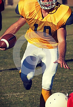 Photo of Running American Football Player