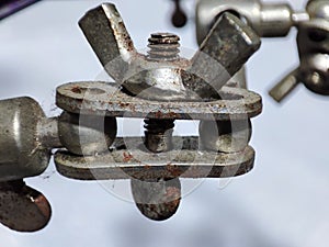 photo of rusty old iron bolt nuts