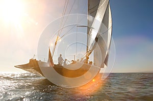 Photo of Sailors sailing on sailboat