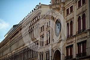 Photo with saint marks clocktower at piazza san marco