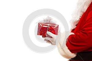 Photo of Santa Claus gloved hands holding red giftbox, isolated on white background Christmas