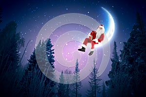 Photo of santa claus sitting on the moon