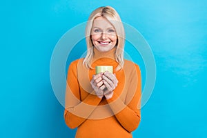 Photo of satisfied business lady hold cup coffee morning inspiration hot beverage wear trendy sweater isolated on cyan