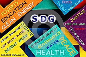 Photo on SDG Sustainable Development Goals theme. The acronym  `SDG` on a colorful background. Sustainable development concept photo