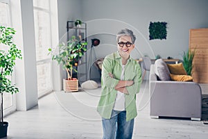 Photo of selfassured business woman crossed hands confident spending working days inside spacious office open space photo