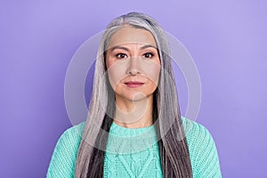 Photo of senior pretty woman clever long hair focused manager agent  over violet color background