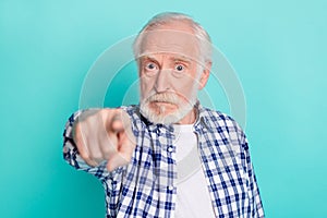 Photo of serious negative mood grandfather misunderstanding blaming you isolated on teal color background