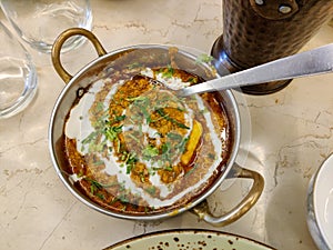 Photo of a serving of dal tadka fry, a classic Indian dish, captured with a close-up