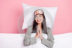 Photo of shiny pretty lady sleepwear mask lying pillow covered blanket looking empty space smiling  pink color