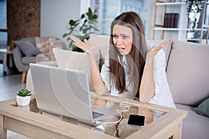 Photo of shocked amazed unhappy upset businesswoman having problem trouble on video conference remote work at home