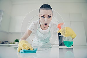 Photo of shocked stunned woman noticed something terrible on table while cleaning room