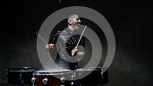 Photo shoot crazy drummer in the rain