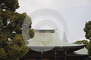 Photo of skyscraper Behind Meiji Shrine