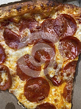 Big Slice of Carryout Pepperoni Pizza for Lunch photo