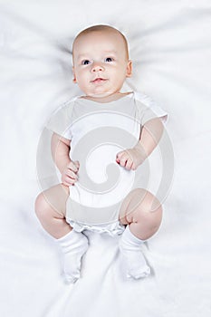 Photo of smiling three-month child