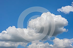 Photo of some white whispy clouds and blue sky cloudscape. Beautiful blue sky and white clouds