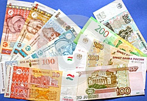 Photo of somoni bank notes from Tajikistan and Russian ruble bank notes