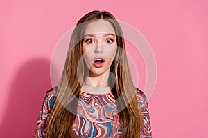 Photo of speechless stunned impressed girl with straight hairdo dressed print shirt staring open mouth isolated on pink photo