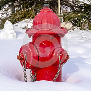 Photo Square frame Vibrant red fire hydrant against fresh snow during winter in Park City Utah