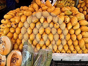 Stack of mangos for Sale at a Market in Chilpancingo photo
