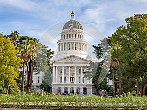 A photo of the State Capitol Building in Sacramento, California on a beautiful blue sky day