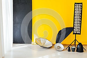 Photo studio equipment accessories photographer on a yellow background