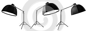 Photo studio lighting stands with flash and octobox isolated on the white.