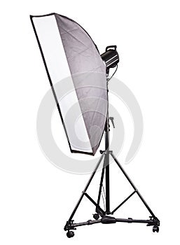 Photo studio lighting stands with flash and softbox isolated on the white