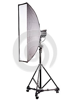 Photo studio lighting stands with flash and softbox isolated on the white.