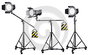 Photo studio lighting stands with flash and softbox isolated on the white