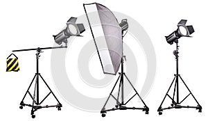 Photo studio lighting stands with flash and softbox isolated on the white