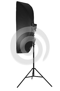 Photo studio lighting stands with flash and softbox isolated on the white.