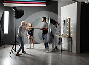 Photo studio with professional equipment and t workers