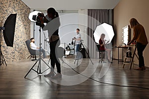 Photo studio with professional equipment and team
