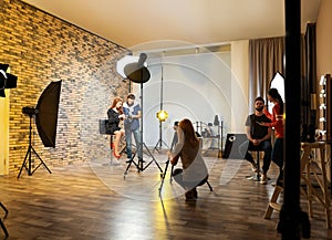Photo studio with professional equipment and team