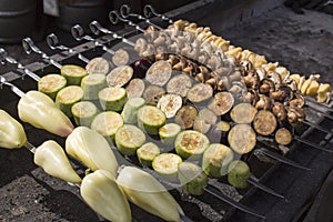 Photo of Summer grilling food. Raw vegetables on skewers
