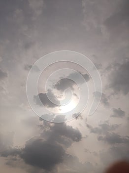 Photo of sun and dark clouds