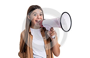 photo of surprised tween girl announcer hold loudspeaker. teen girl announcer