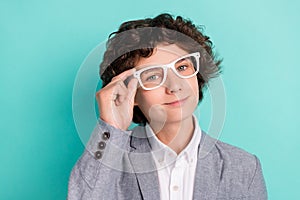 Photo of sweet confident schoolboy dressed grey suit glasses smiling isolated teal color background