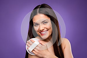 Photo of sweet shiny mature woman naked shoulders smiling pampering skin  violet color background