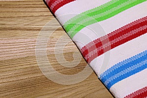 Photo of tablecloth (dishtowel) on wooden table