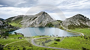 Amazing lake surrounded by the mountains with an impresive color combination, Lago Enol, Picos de Europa photo